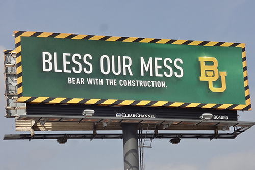 Baylor University billboard text: Bless our mess. Bear with the construction.