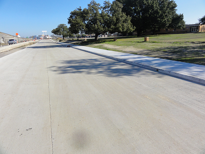 New frontage road and sidewalk pavement